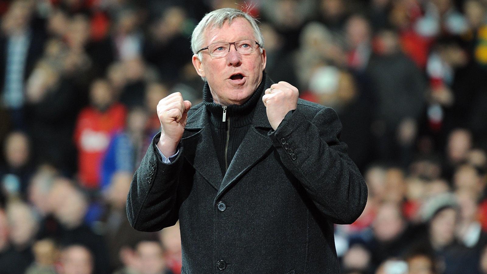 Sir Alex Ferguson salutes the fans during the UEFA Champions League match between Manchester United and Real Madrid at Old Trafford, Manchester, March 2013.