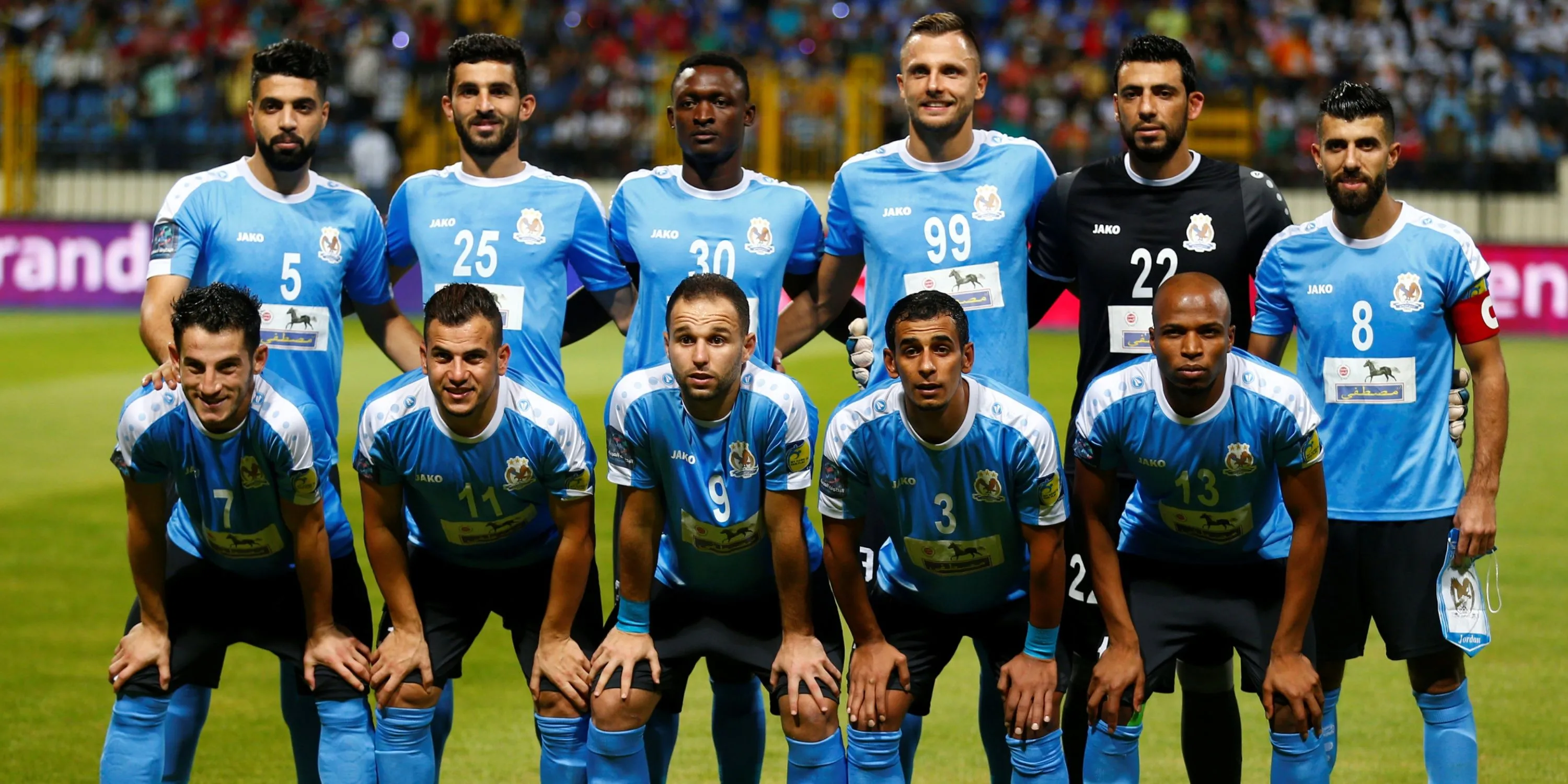 Đội hình Al-Faisaly FC của Jordan trong một trận đấu